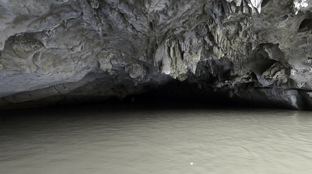 Tam Coc limestone cave and river water